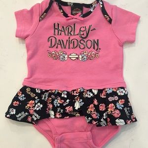 Harley Davidson onsie. Like new. Size 6-9 months. Has a frilly skirt attached.